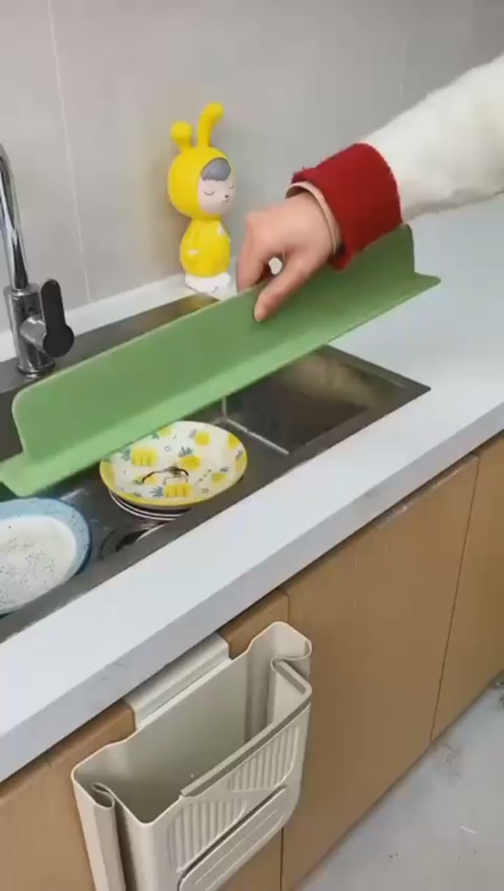 Load video: Silicone Sink Splash Guard With Suction For Kitchen